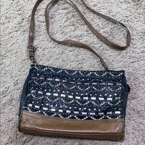 The Sak Black and Tan Crossbody Bag